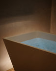 Cold plunge tub filled with chilled water at Regen Recovery Vancouver, designed for post-sauna contrast therapy and inflammation reduction